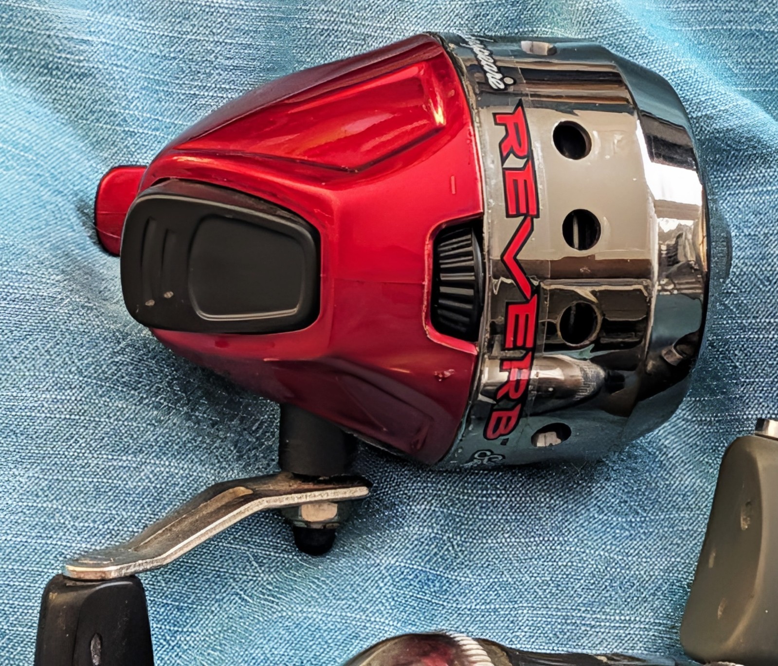 4 Spincast Reel lot: 2 Zebco 33’s, 1 Photon, and 1 Shakespeare Reverb