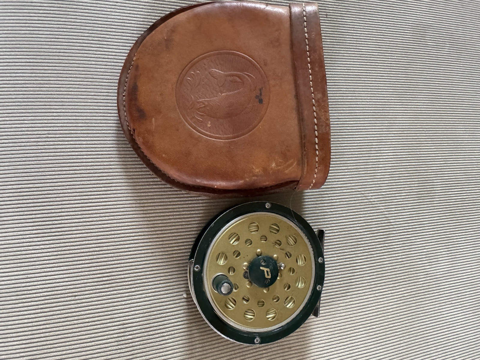 Leather Pouch With Pflueger Reel