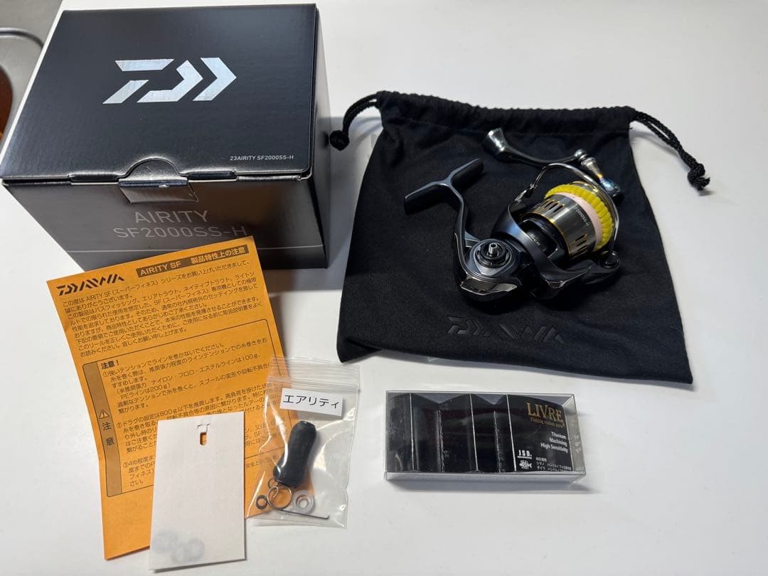 Daiwa AIRITY SF2000SS-H Spinning Reel Black/Silver with Storage Bag Used