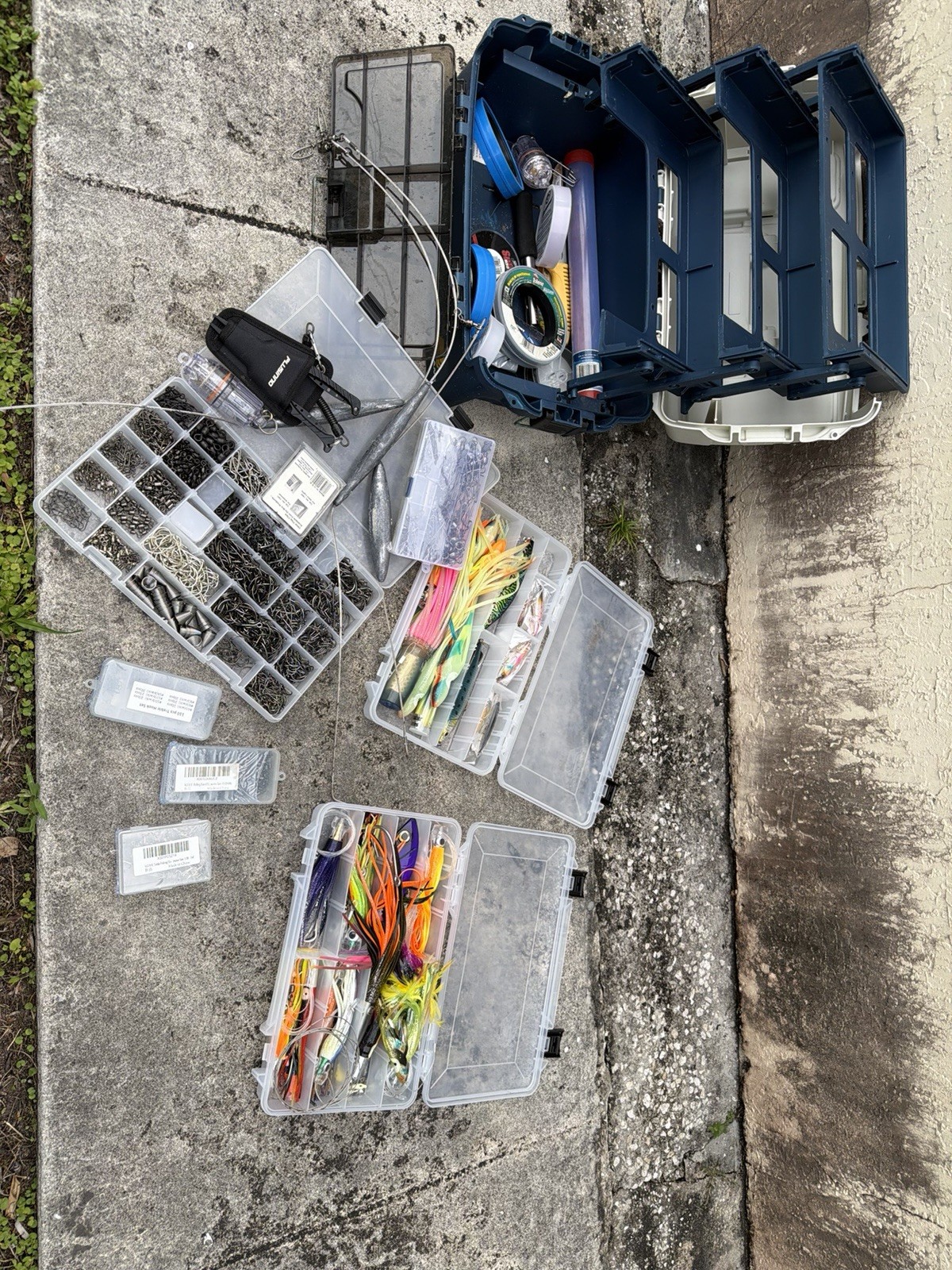 Several Penn Spinning Fishing Reels, 18 rods with reals and 2 tackle boxes.