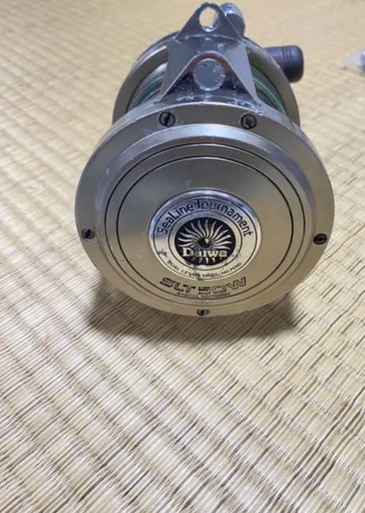 Daiwa Tournament SLT50W / fishing /Reel / scratches and stains /japan