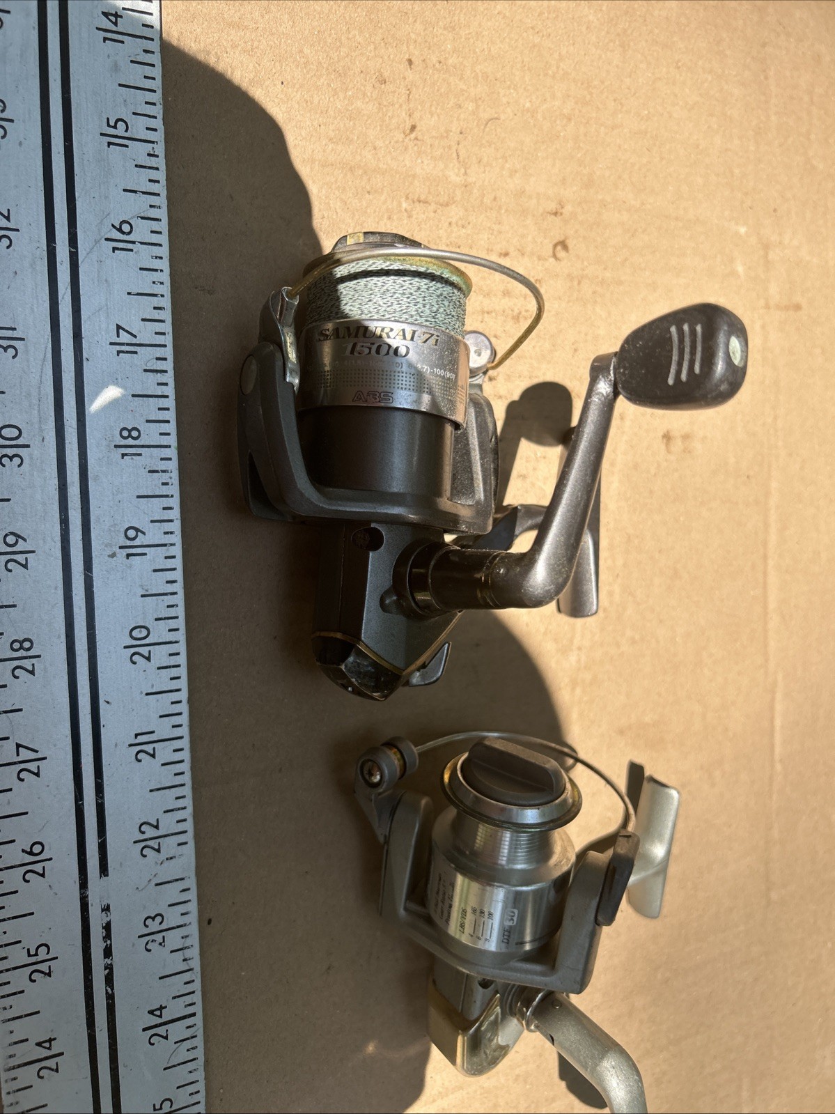 2-spinning Reels One Daiwa And One Pinnacle