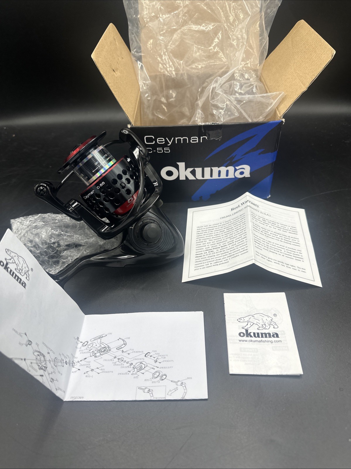 Brand New (open box) Okuma Ceymar Lightweight Spinning Reel- C-55, Black/Red