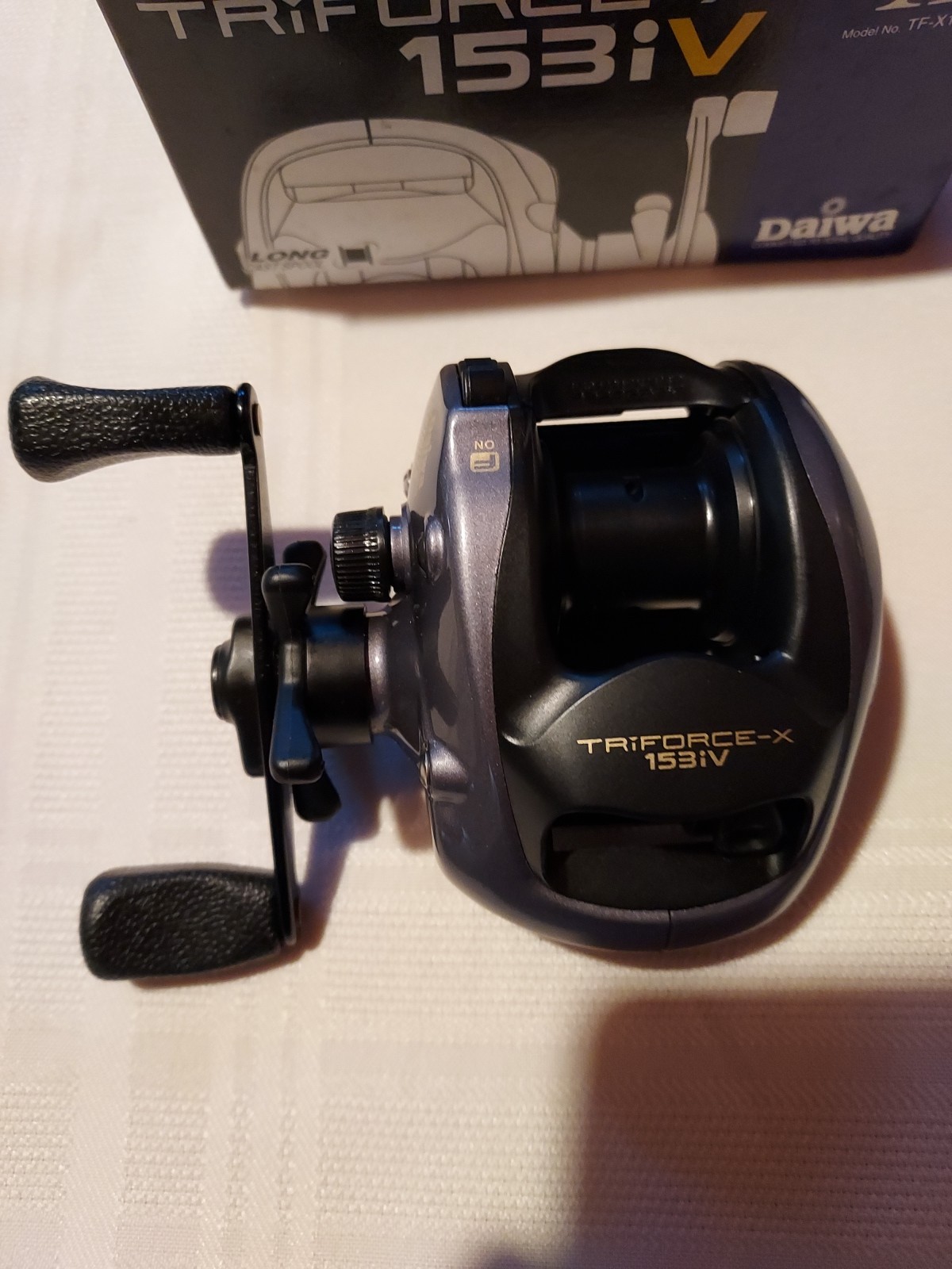 Reel Triforce-x 153iV By DAIWA, model#TF-X153iV, Thailand, New In Box