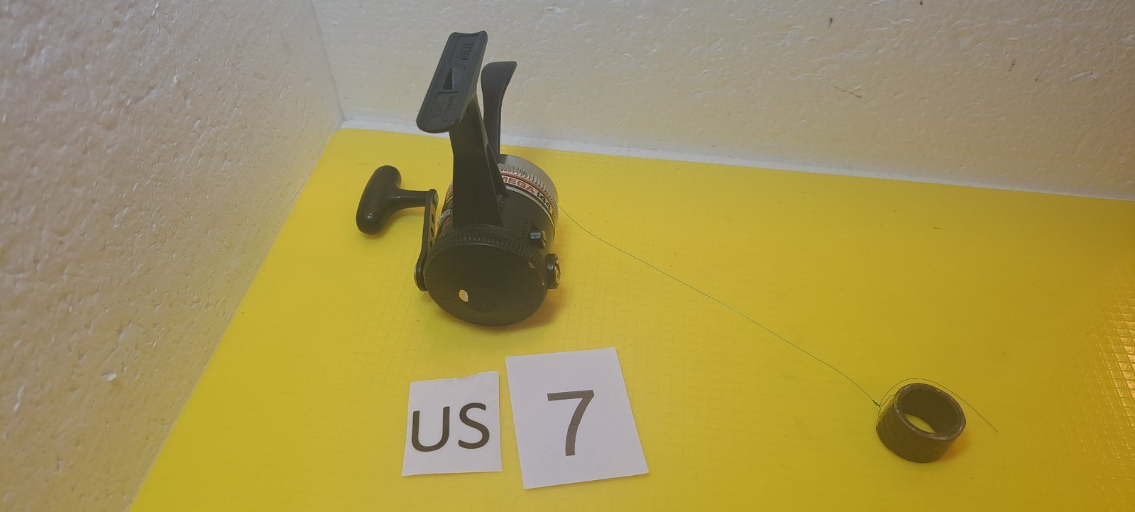 ZEBCO OMEGA 144 TRIGGER SPIN UL REEL WORKING CONDITION #US-7