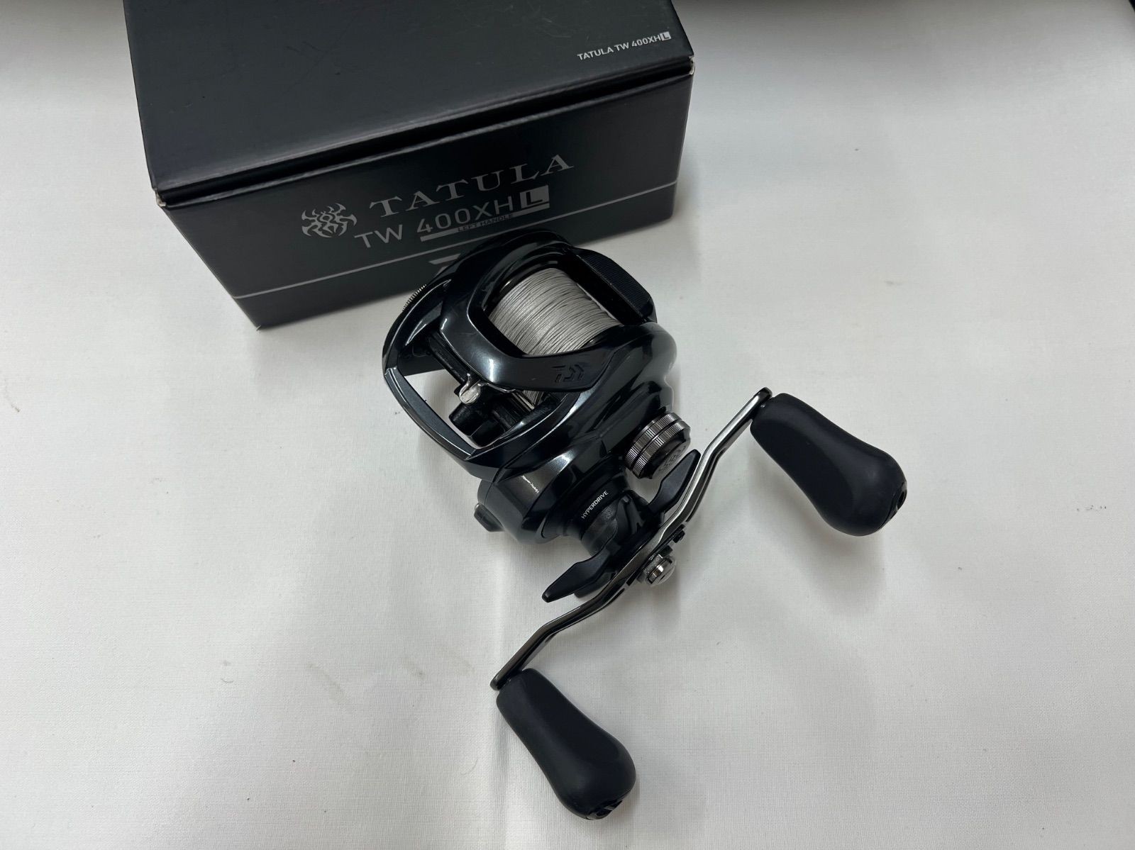 Tatula TW 400XHL Fishing Reel Used with Line and Box