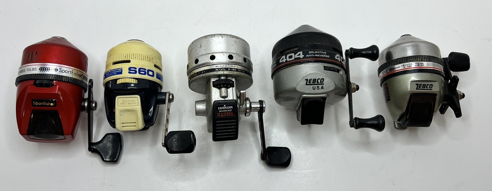 Lot Of 5 Fishing Reels Zebco 404 10/20 Daiwa 212RL S60 Sport fisher 360 ZR + Lin