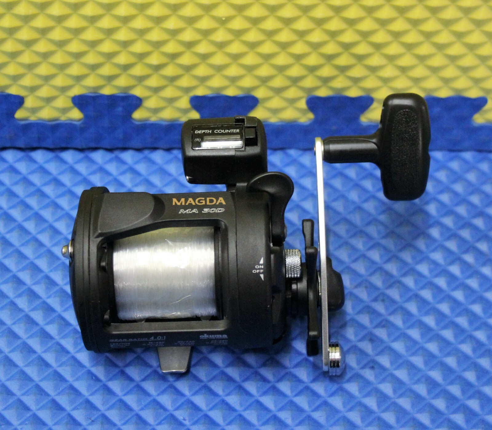 Okuma Magda Line Counter Trolling Reel Pre-spooled w/17lb/385yd Mono MA 30D