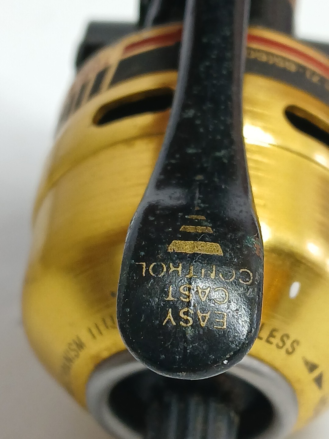 Vintage Gold Daiwa Us40 Reel -Mark Of Precision underspin trigger cast Reel