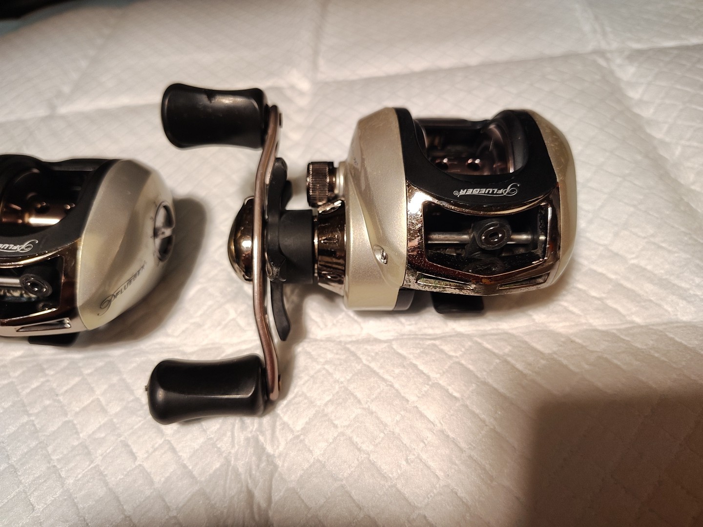 (2) PFLUGER ( TRION ) BAITCASTING REELS # TRI62LP/ SEE PHOTOS