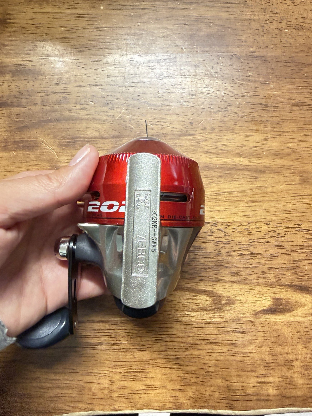Zebco 202 Spincast Reel Right Hand Wide Range Drag Anti-Reverse Red/Silver 202KR