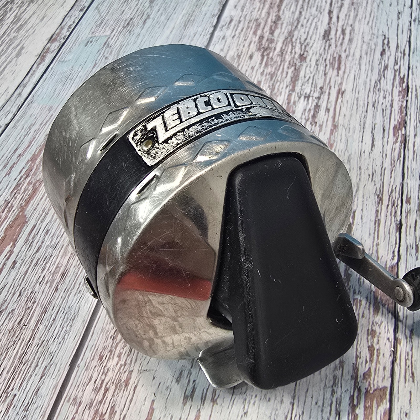 Zebco One Fishing Reel Made in USA Spincast RH Retrieve Brass Gears