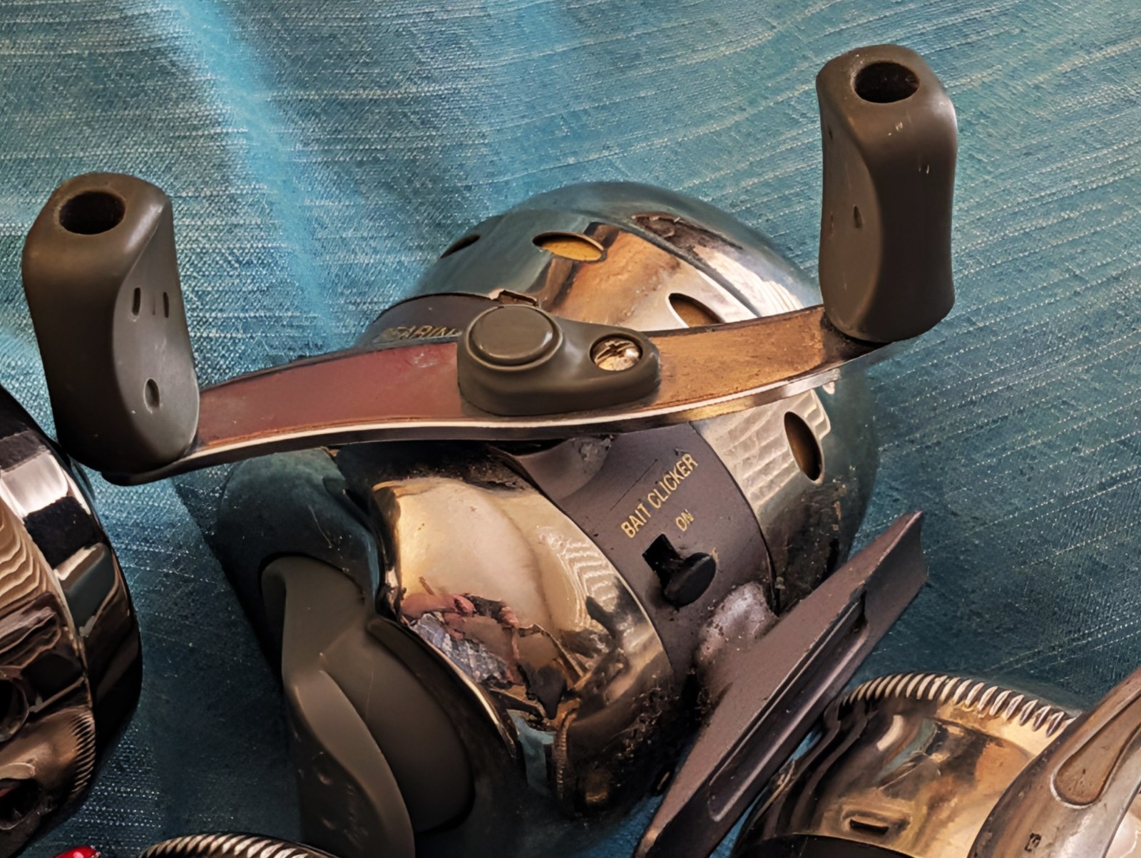 4 Spincast Reel lot: 2 Zebco 33’s, 1 Photon, and 1 Shakespeare Reverb