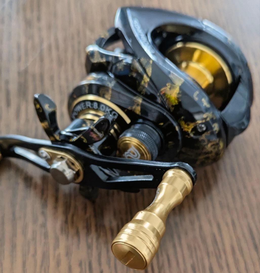 PROBEROS Japanese pattern double-shaft reel black & gold unused left-hand