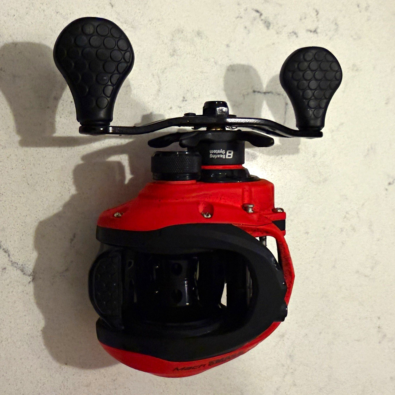 Lew’s Mach Smash SLP Low Profile Baitcast Reel 8.3:1 Left Hand Red/Black