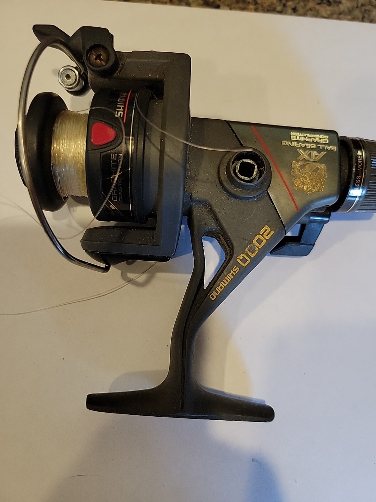 Shimano 200Q Spinning Fishing Reel AX Bio Grip Graphite Rear Drag