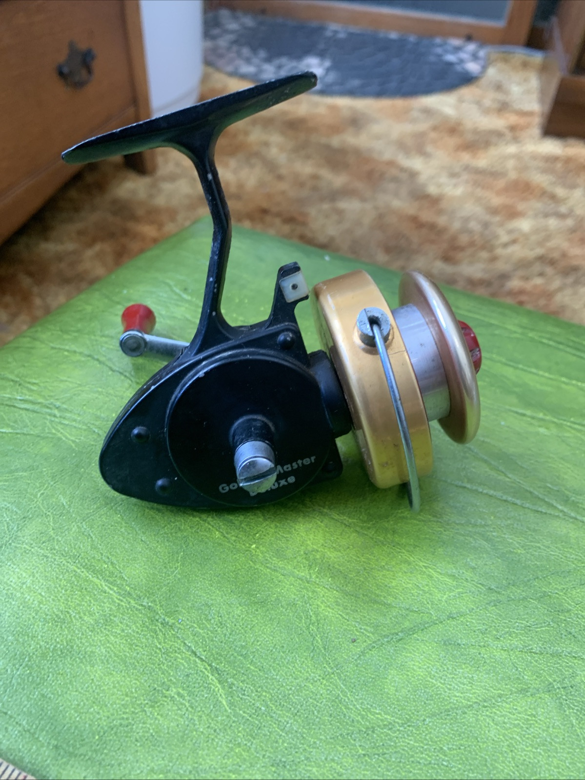 Unusual Vintage Fishing Reel Golden Master Deluxe Mid Century Black Gold