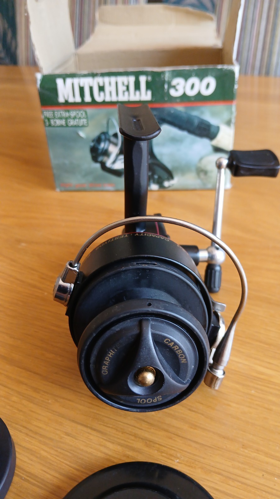 A very good boxed Mitchell 300 Fishing reel 2 spools, spoolpot & paperwork.