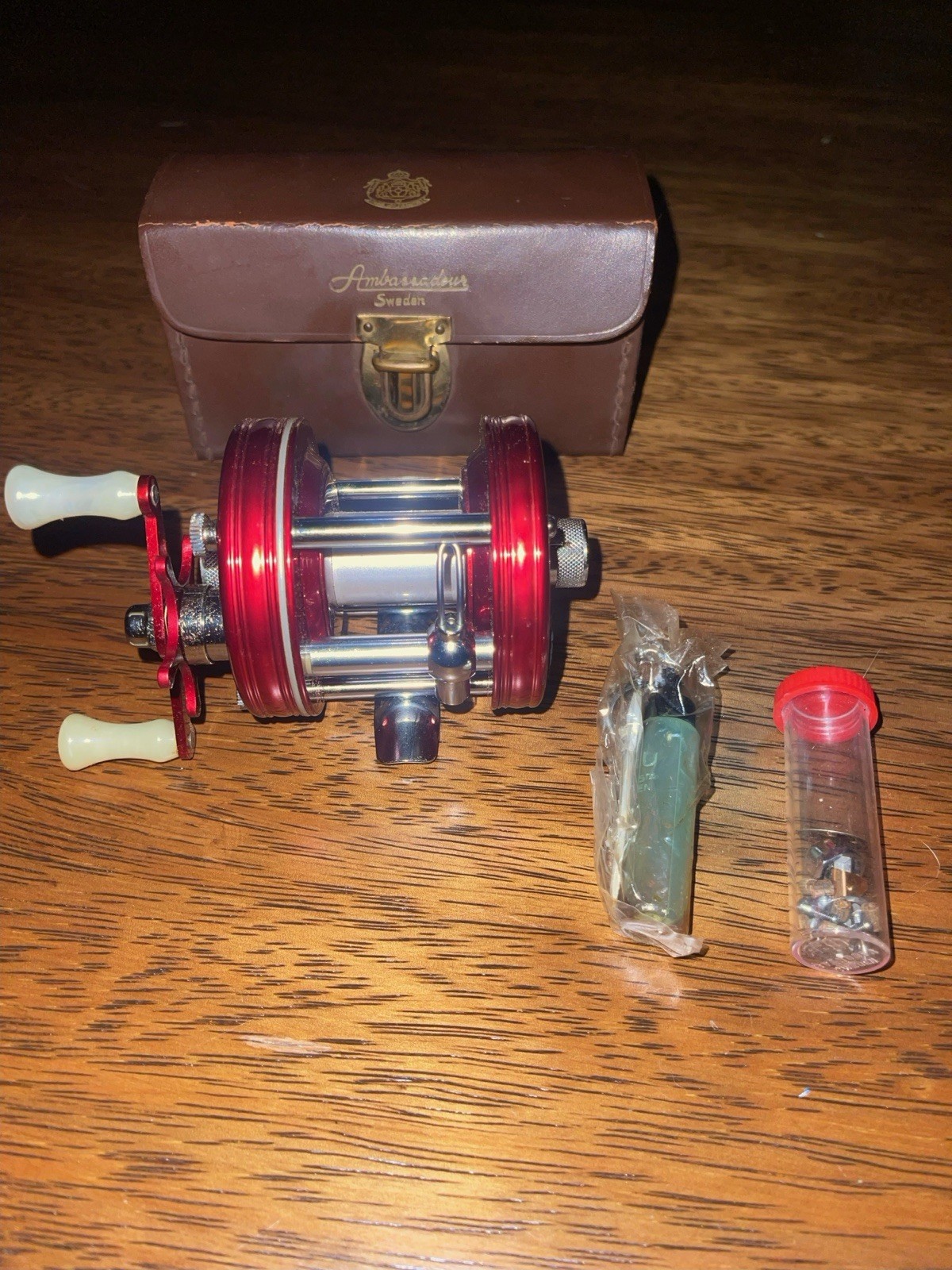 abu garcia ambassadeur 5000 red with case and oil bottle