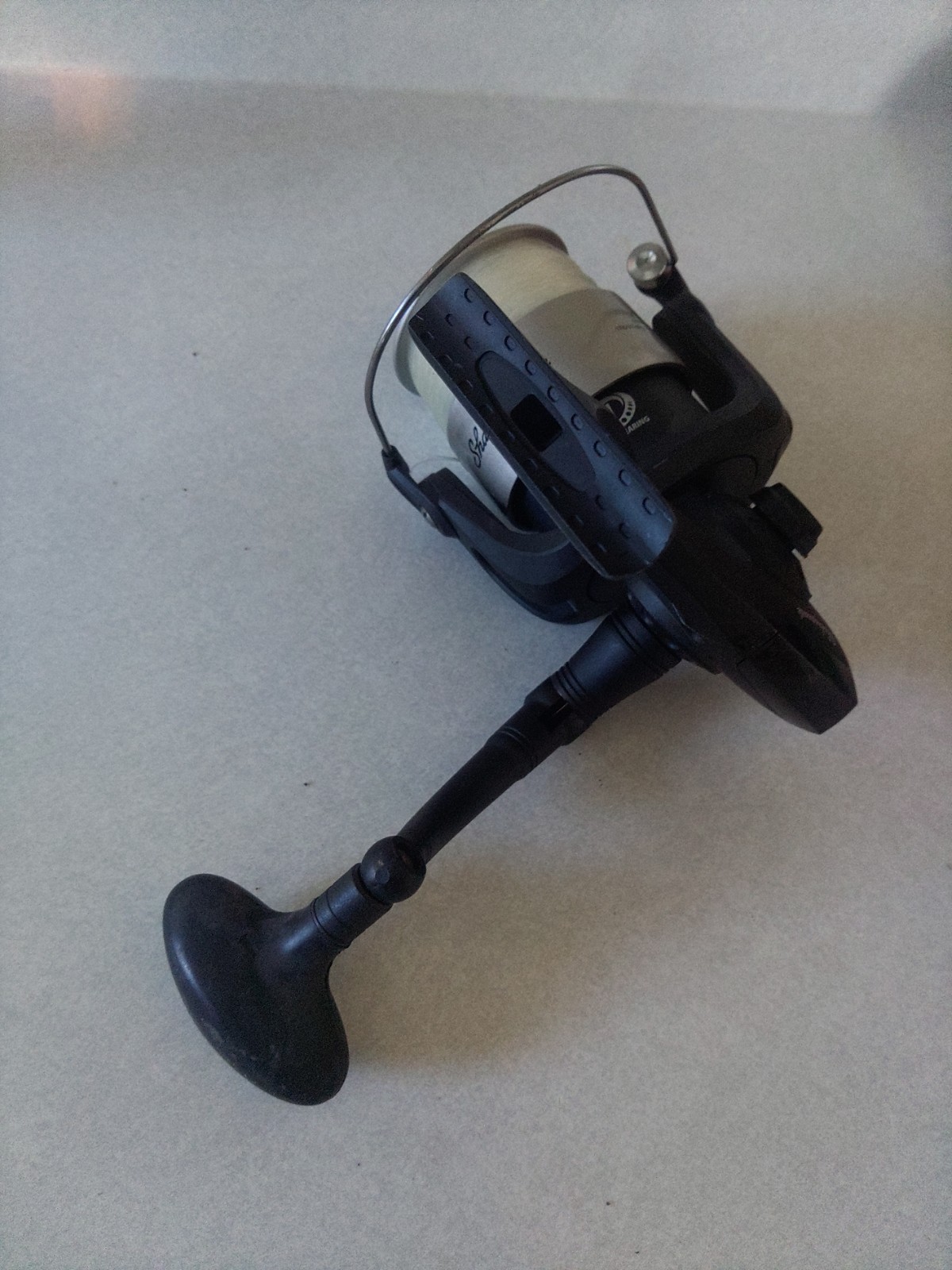 Shakespeare Fishing Alpha 70 Spinning Reel 4.1:1 Pre-Spooled With 20 LB Line.