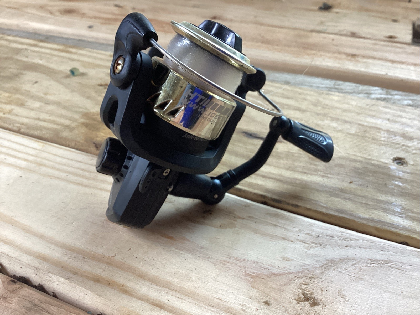 FRESHWATER FISHING REEL LIGHTLY USED, REPAIRED AND BEAND NEW LINE ADDED!