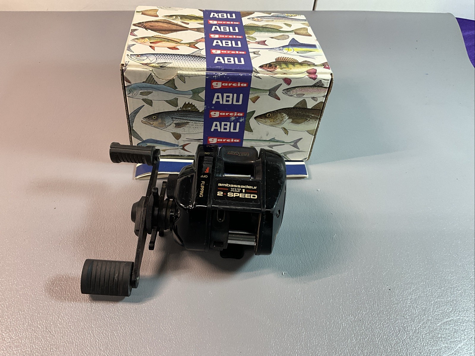 LIGHTLY USED RH ABU GARCIA AMBASSADEUR XLT1 2 SPEED REEL, (R120).