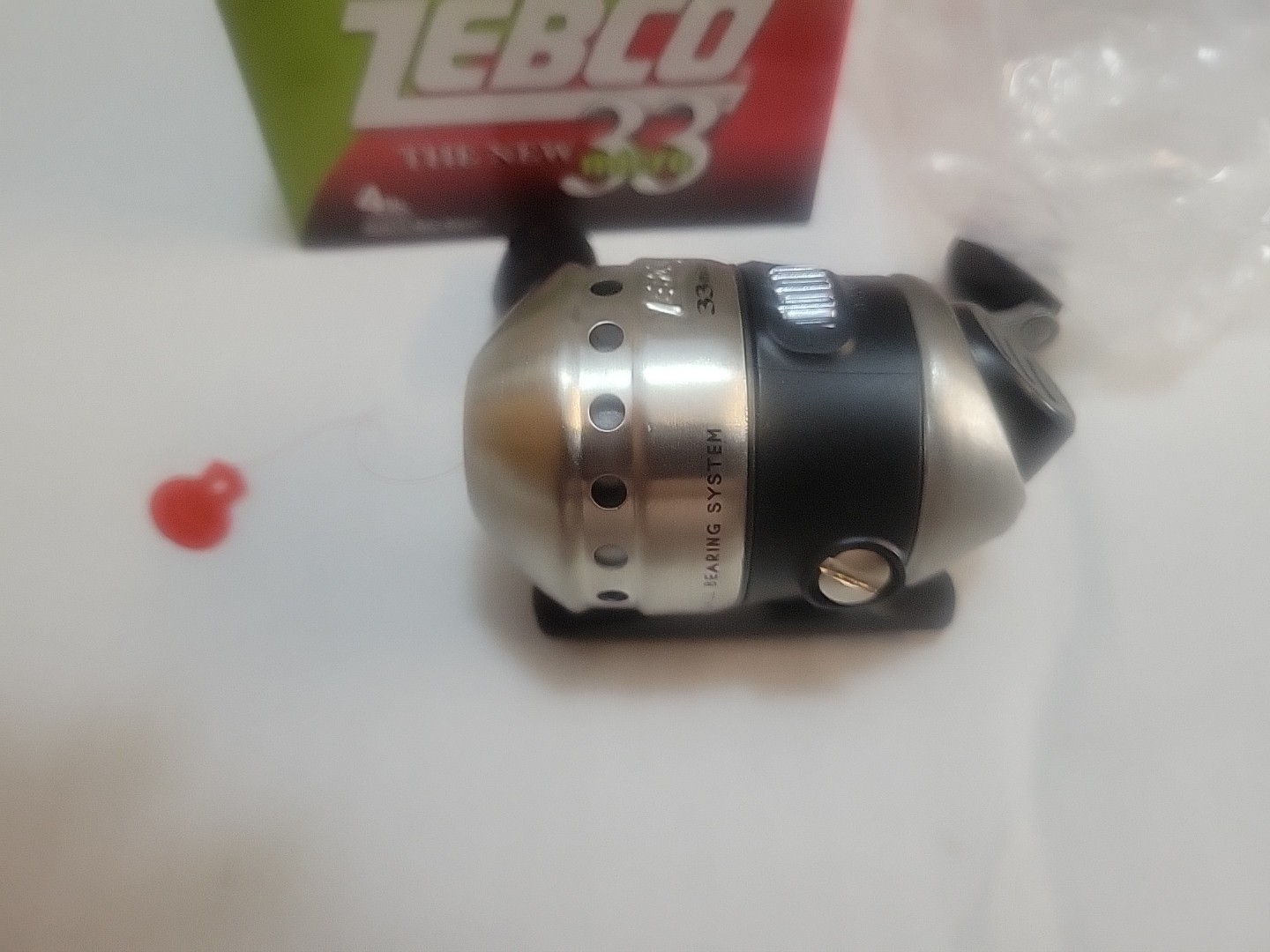 NOS Zebco 33 micro 2014 Stainless Cover. 4.3:1 Ratio. Bite Alert.100yds 4lb Mono