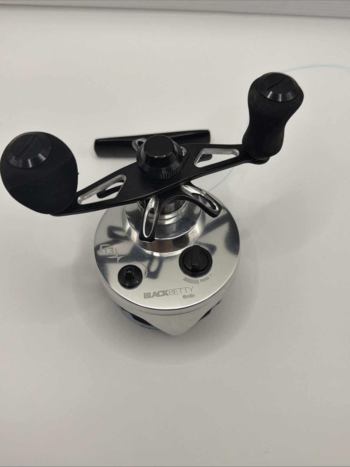 13 Fishing Black Betty 6061 Ice Fishing Reel Inline Silver Black Left Hand Hunt