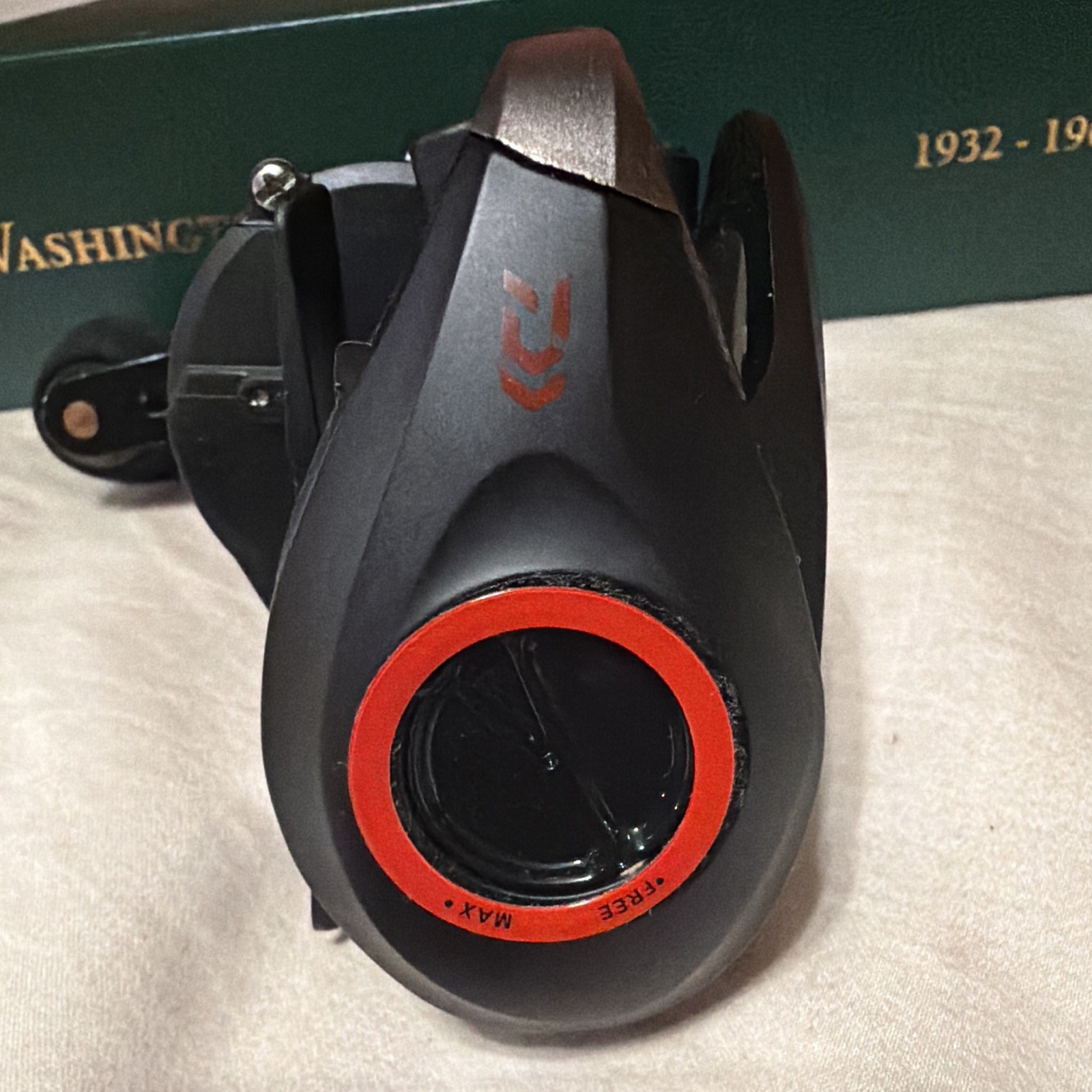Daiwa Baitcast Reel Right Hand Star Drag Black/Red Double Paddle Handle