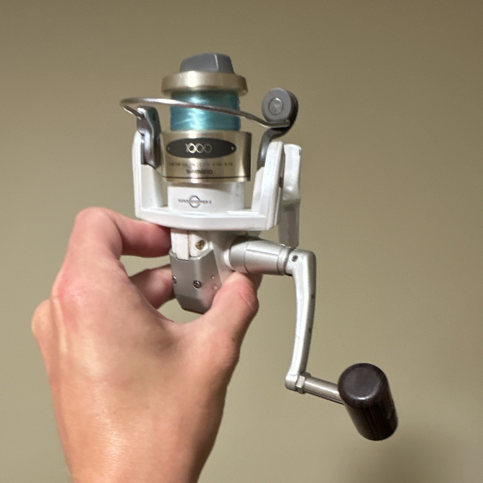 Shimano Stradic 1000 Spinning Reel, Pre-Spooled White/Silver, 4.1:1, Front Drag