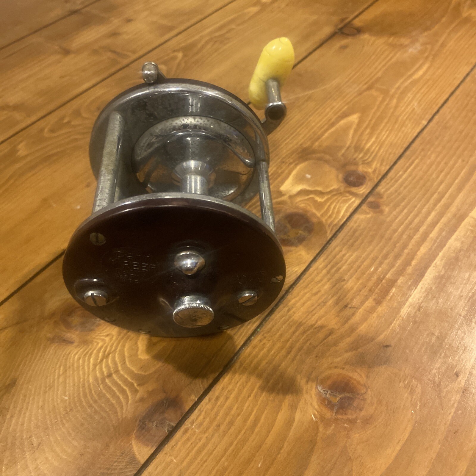 Penn Maroon Peer # 209 with a Metal Spool & a Beige Knob. Tested R-5