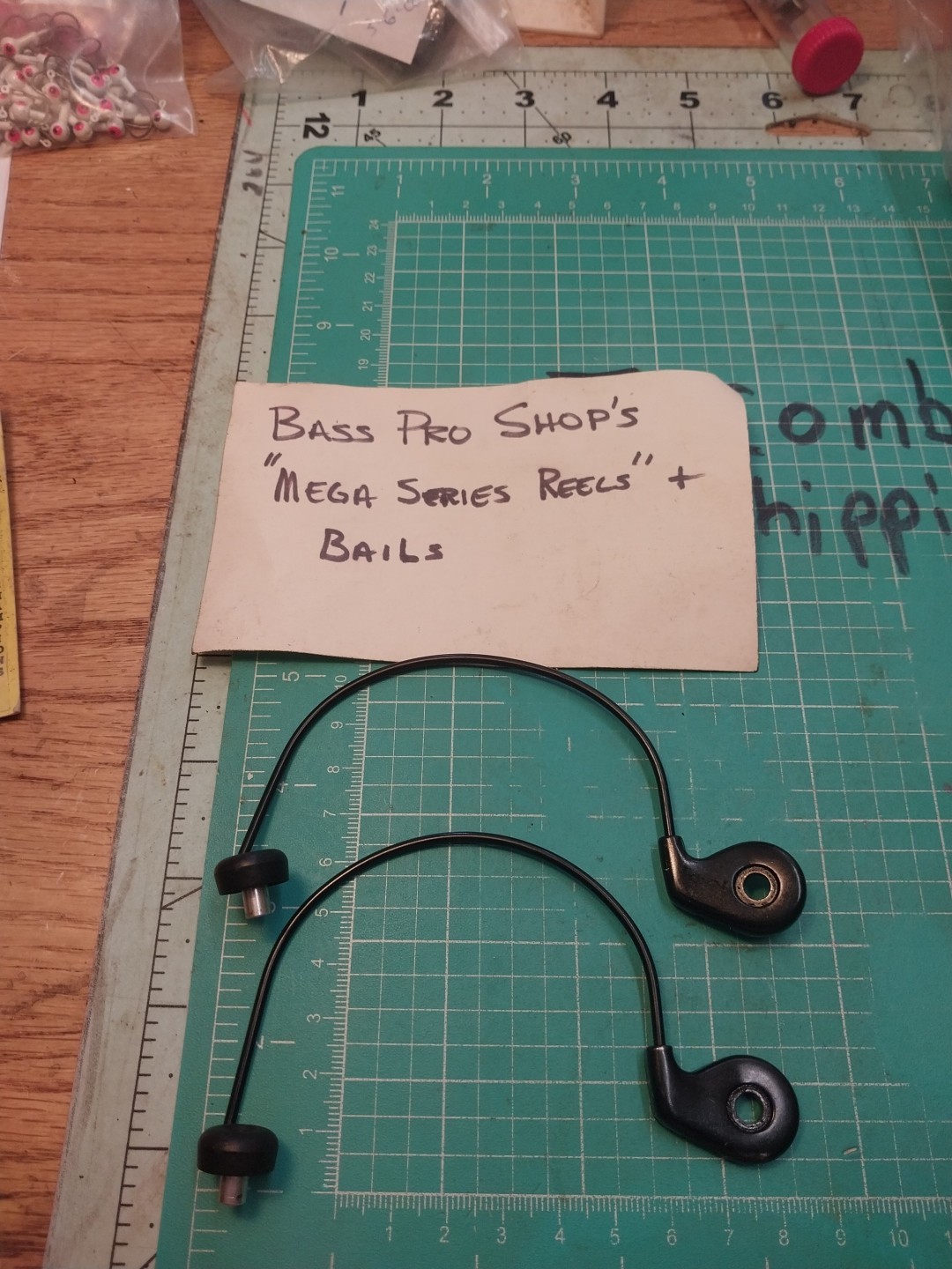 Older Bass Pro Shop Mega Series’s Reel Wire Bails New