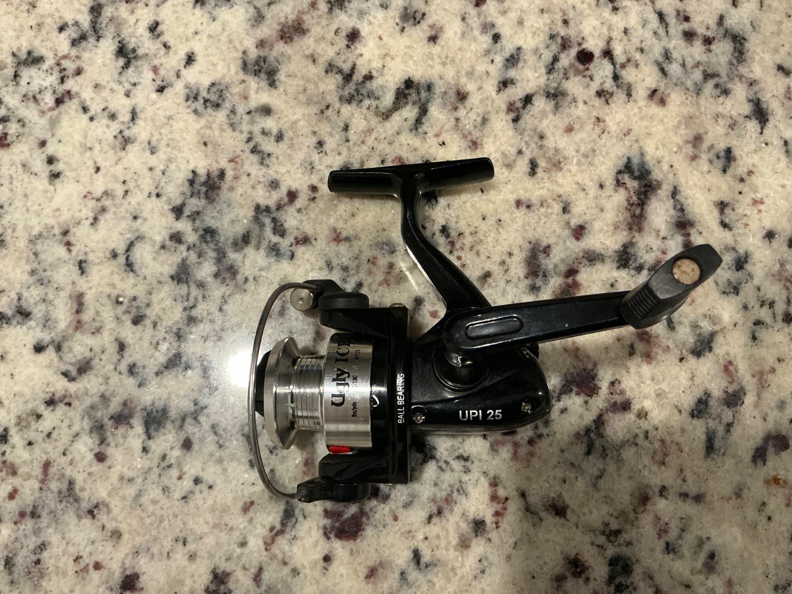 ugly stick ice upi 25 reel. a+ works great