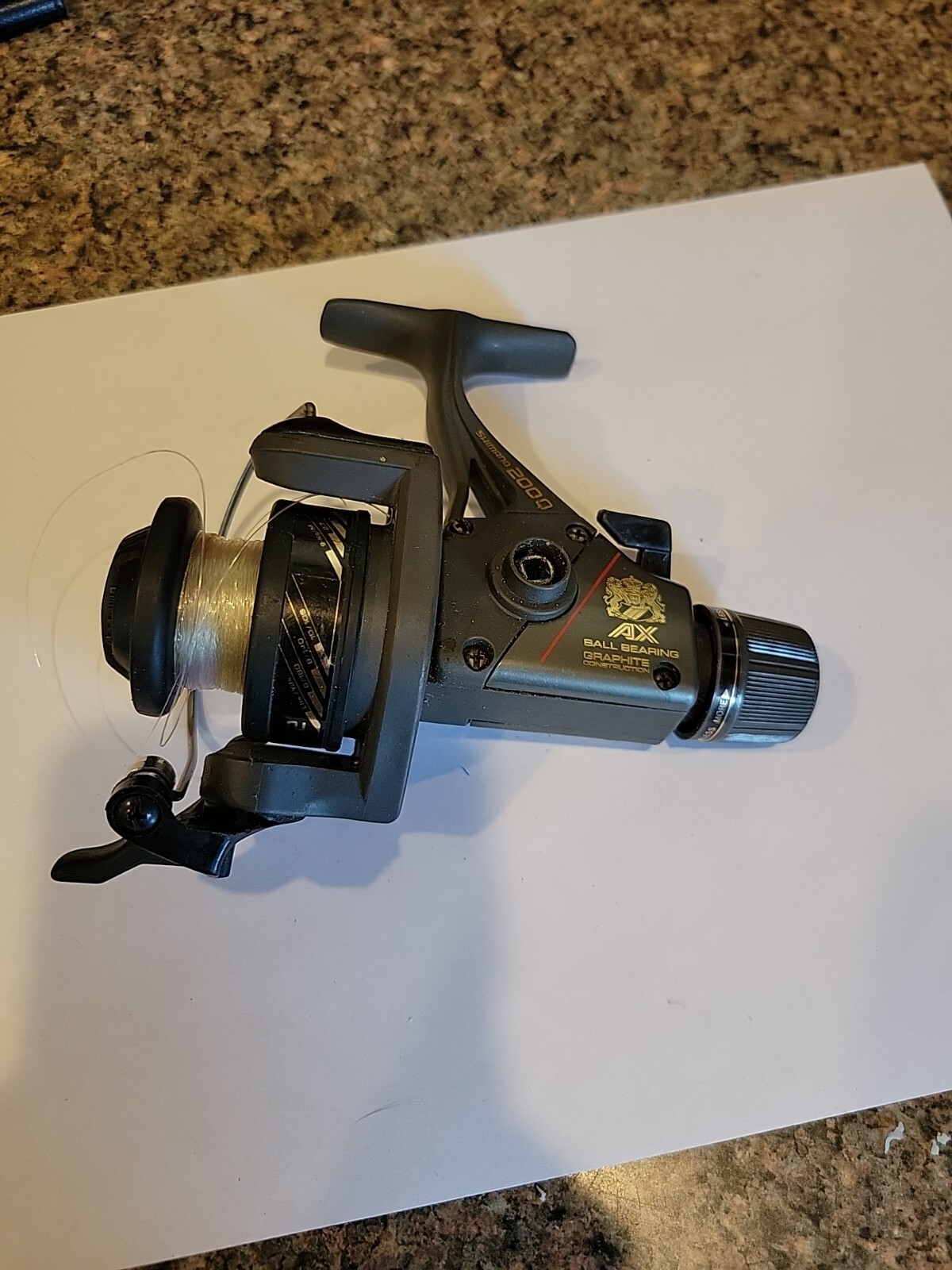 Shimano 200Q Spinning Fishing Reel AX Bio Grip Graphite Rear Drag