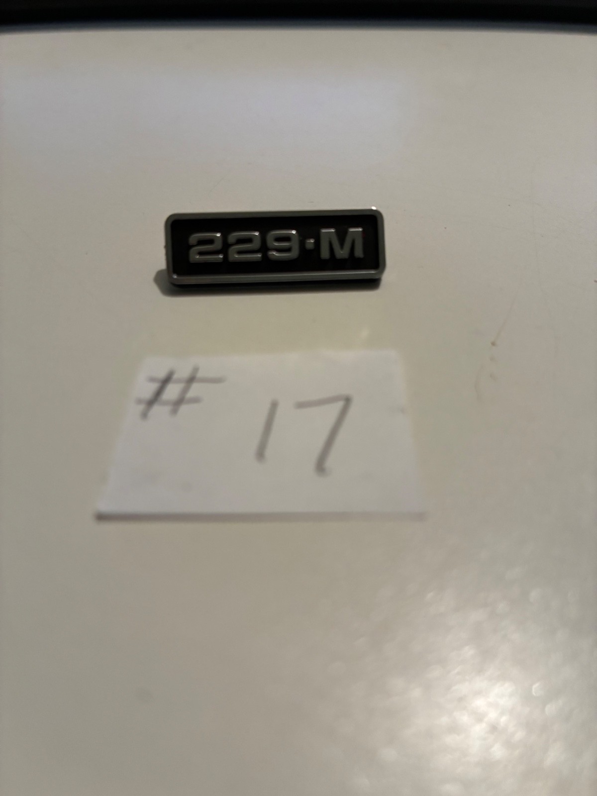 1-Newell -229-M Badge