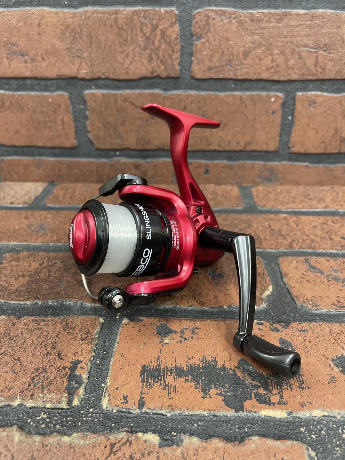 Zebco Slingshot Size 20 Red Spinning Reel Factory spooled 155 yds. 8lb. Line