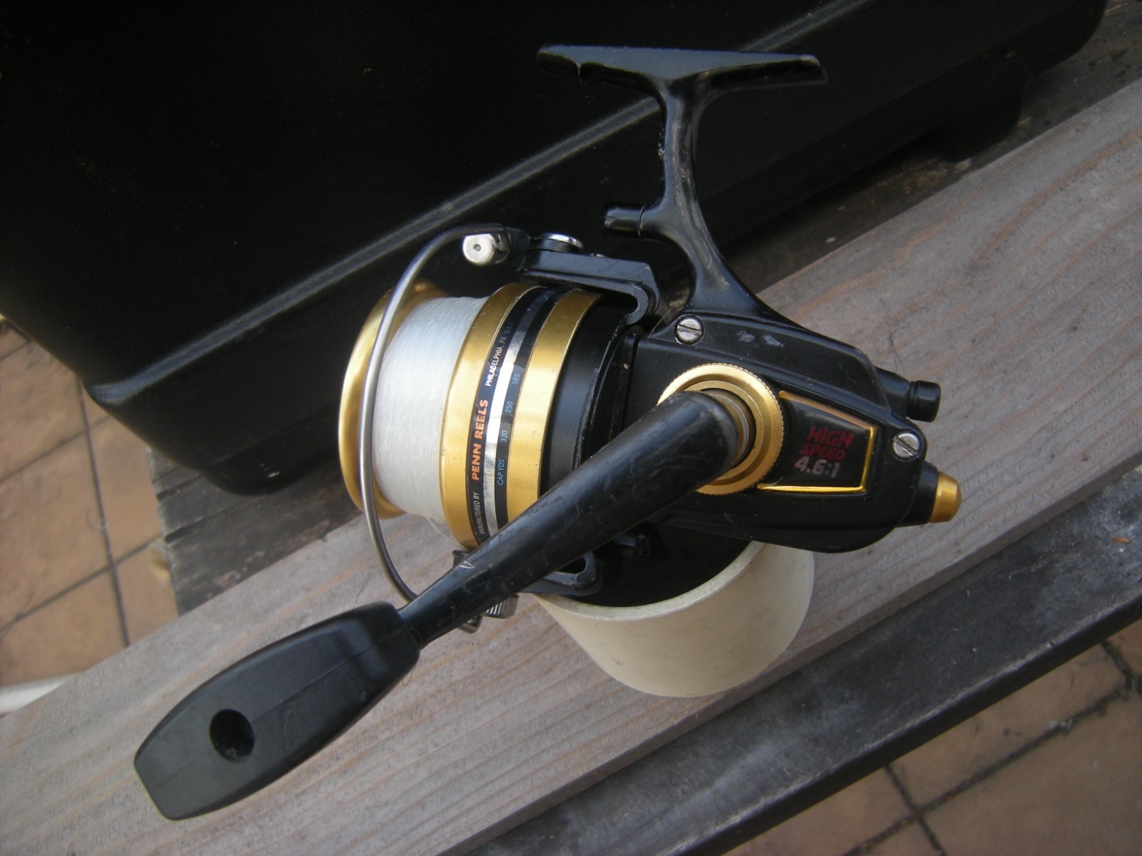 Penn 7500 SS Skirted Spool Spinning Reel – Black/Gold Anodized