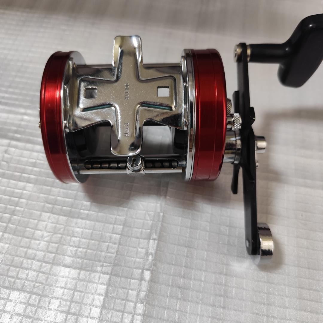 Abu Garcia ABU Ambassador 7000 Red with box, instruction manual, and user’s