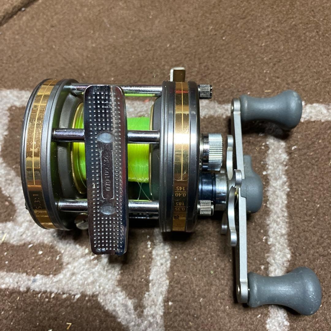 Abu Garcia Ambassadeur Bait Reel Silver Gray Green Line Used