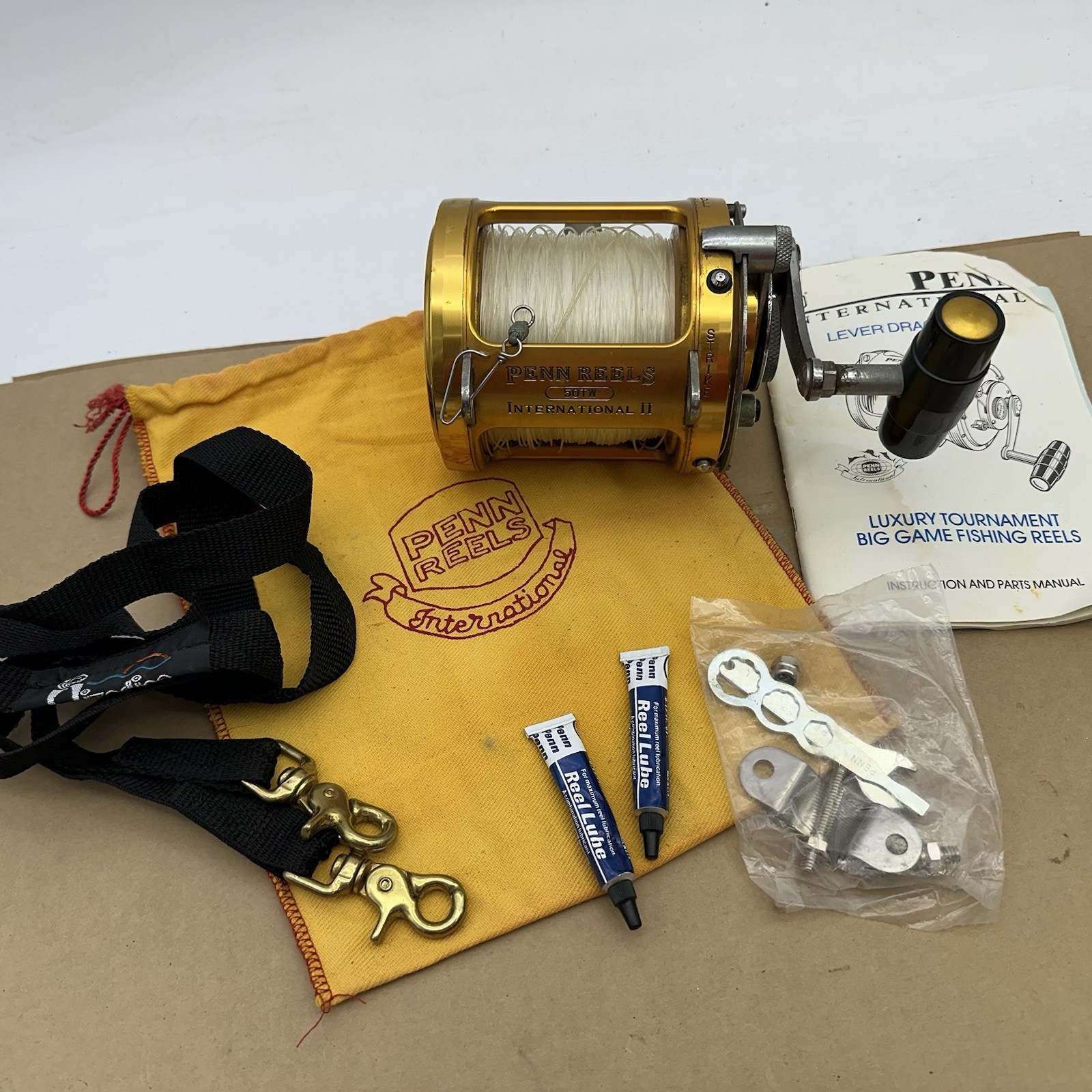 Penn International II 50TW Lever Drag Saltwater Reel W Bag Manual NOS Rod Clamp