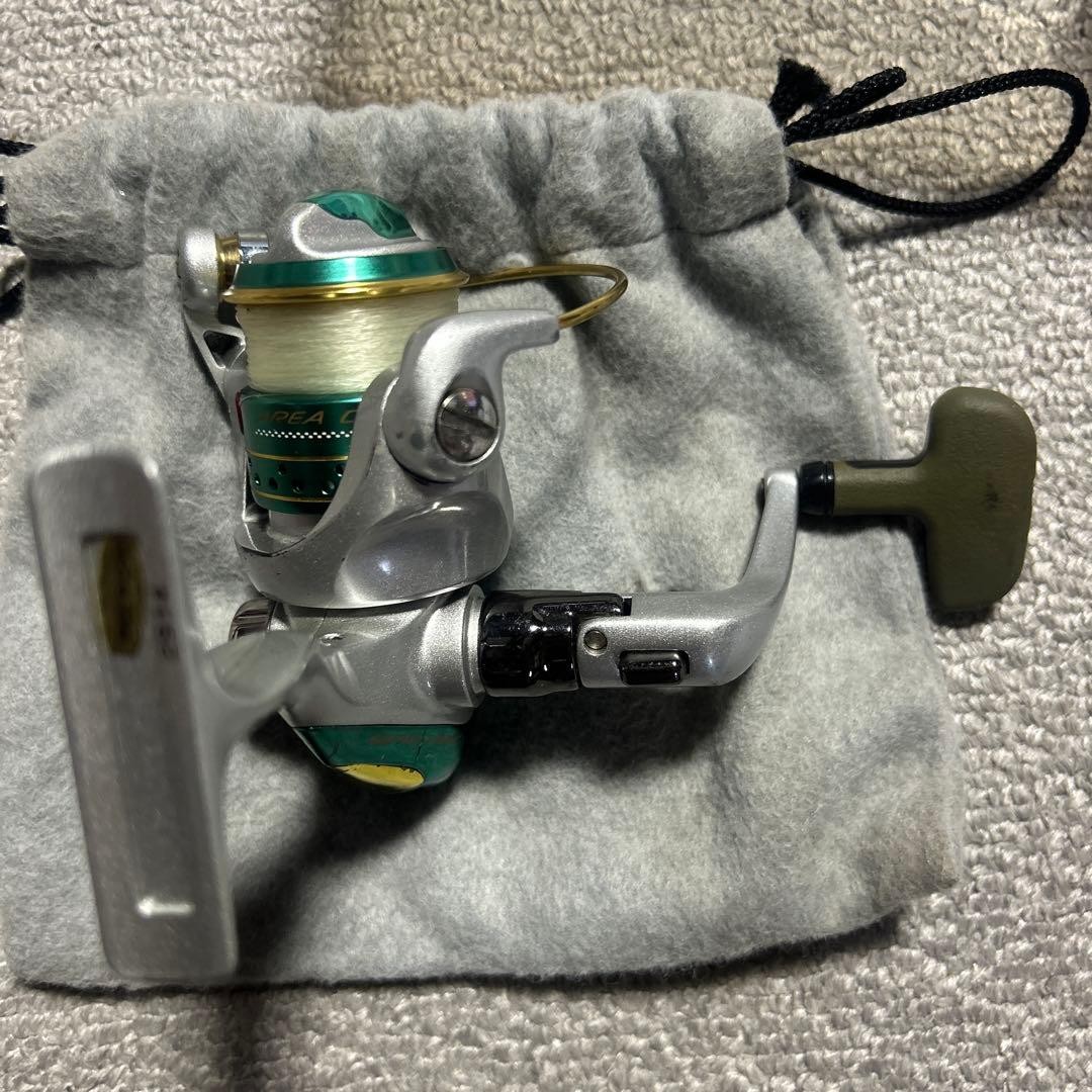 Shimano Fishing Reel Silver Green With Storage Bag