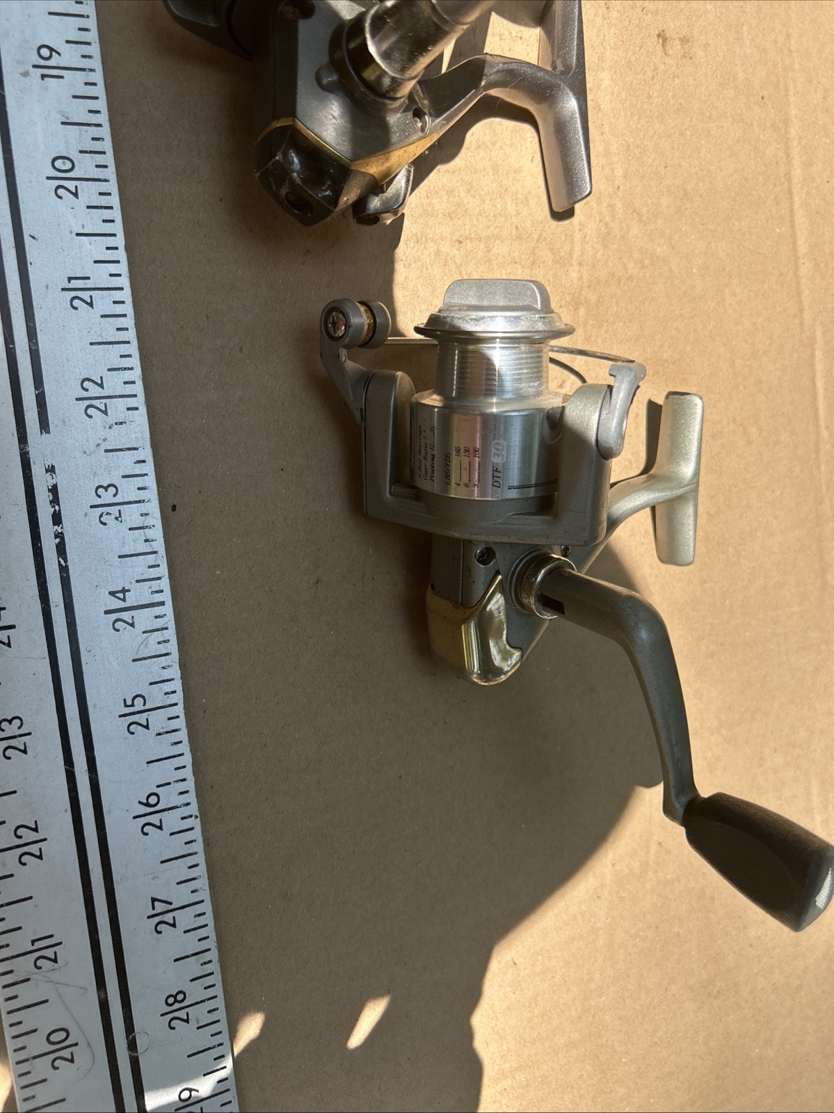 2-spinning Reels One Daiwa And One Pinnacle