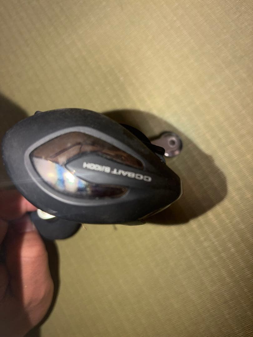 Black and Purple Design Reel with Rubber Grip Used