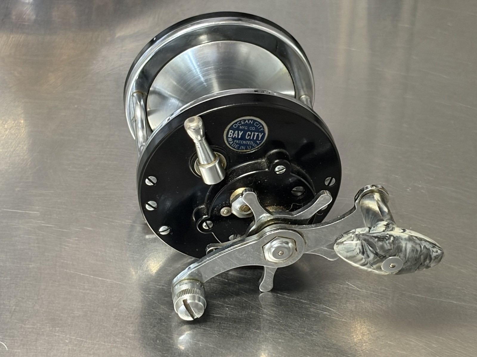 Ocean City Bay City 250 Fishing Reel Conventional Star Drag Marbled Black Handle