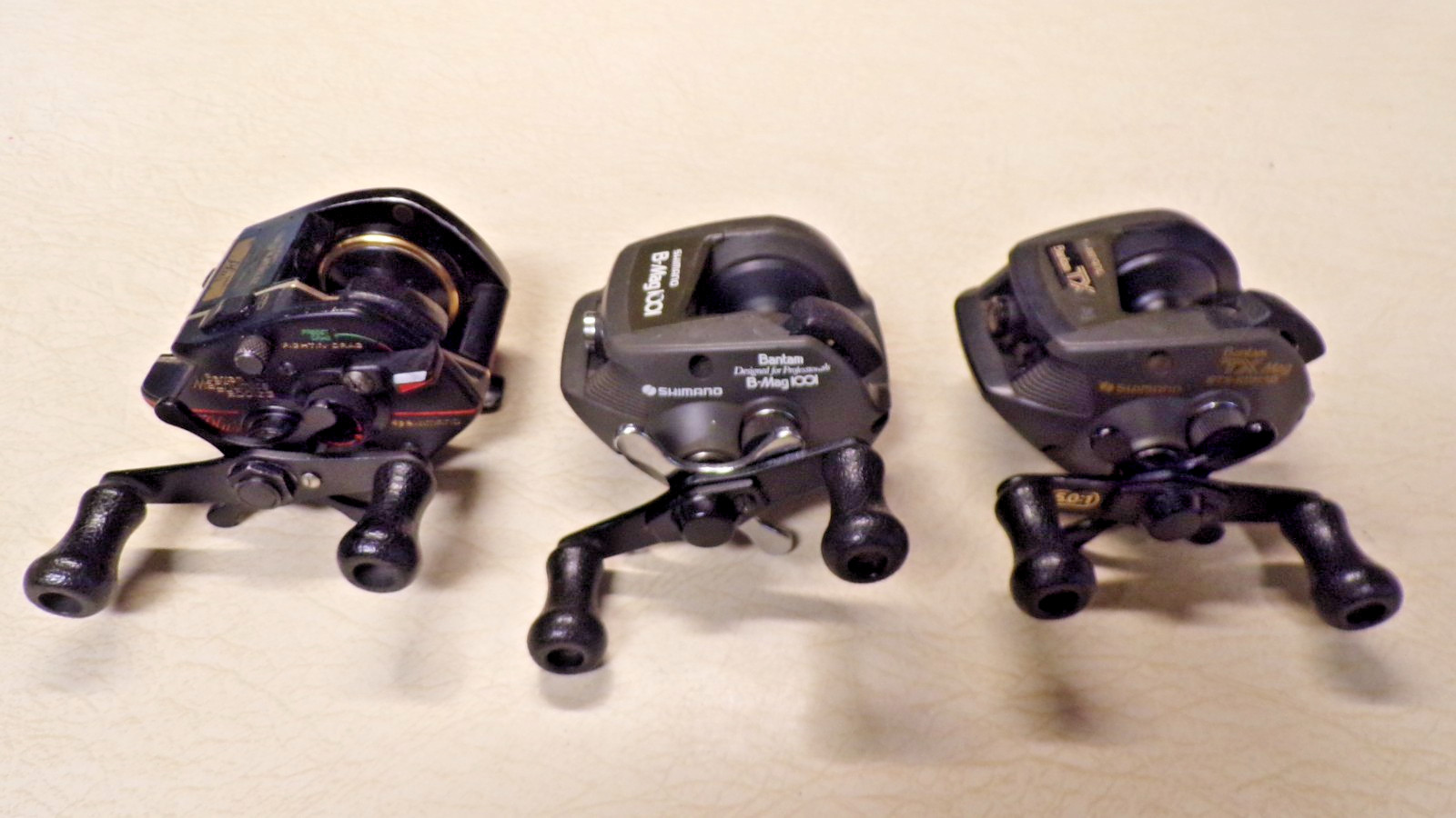 3 – SHIMANO FISHING REELS – LEFT HANDED MODELS – REELS WORK GOOD