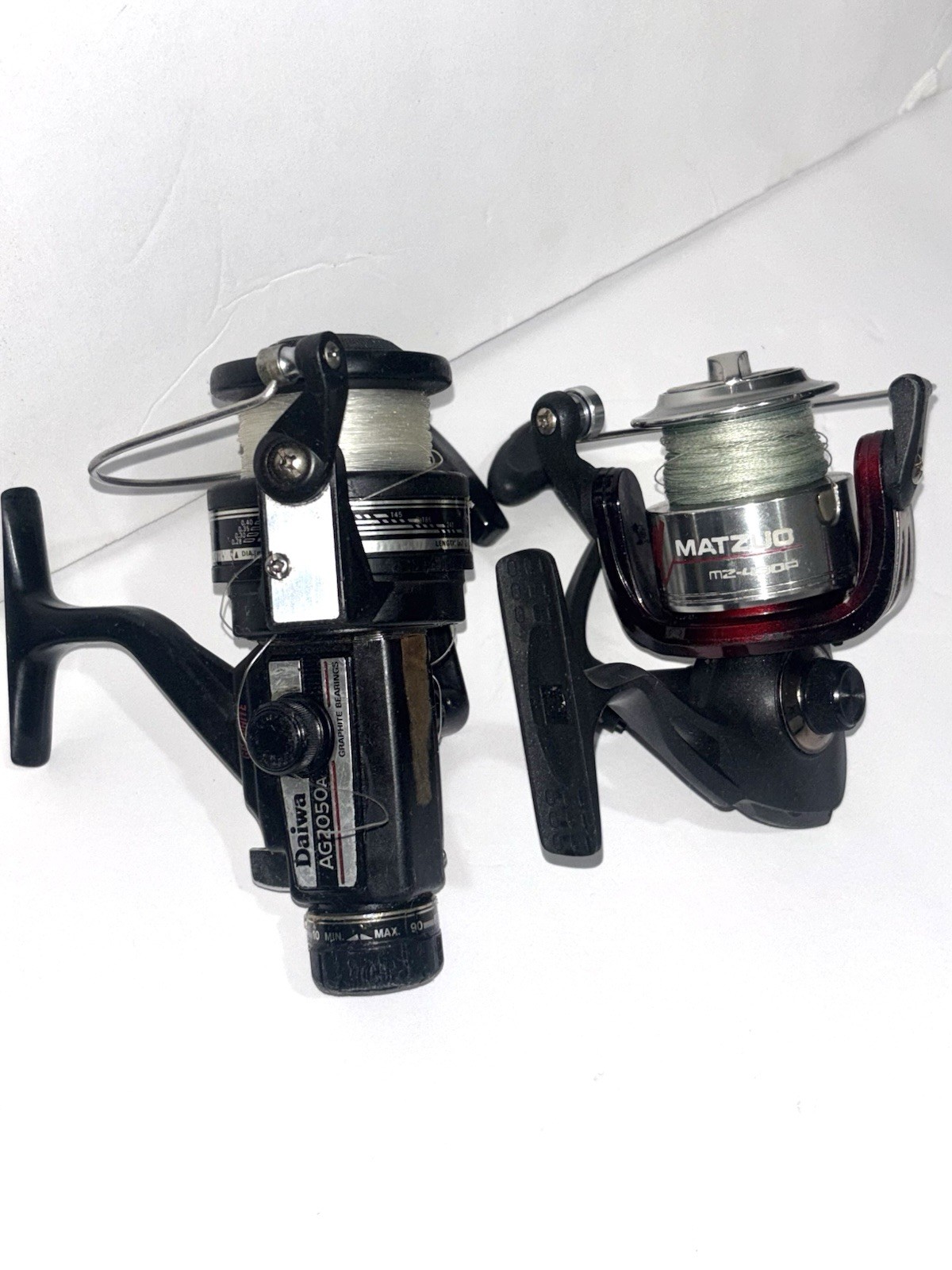 Set of Daiwa AG2050A and Matzuo MZ-430A Fishing Reels Used Some Wear