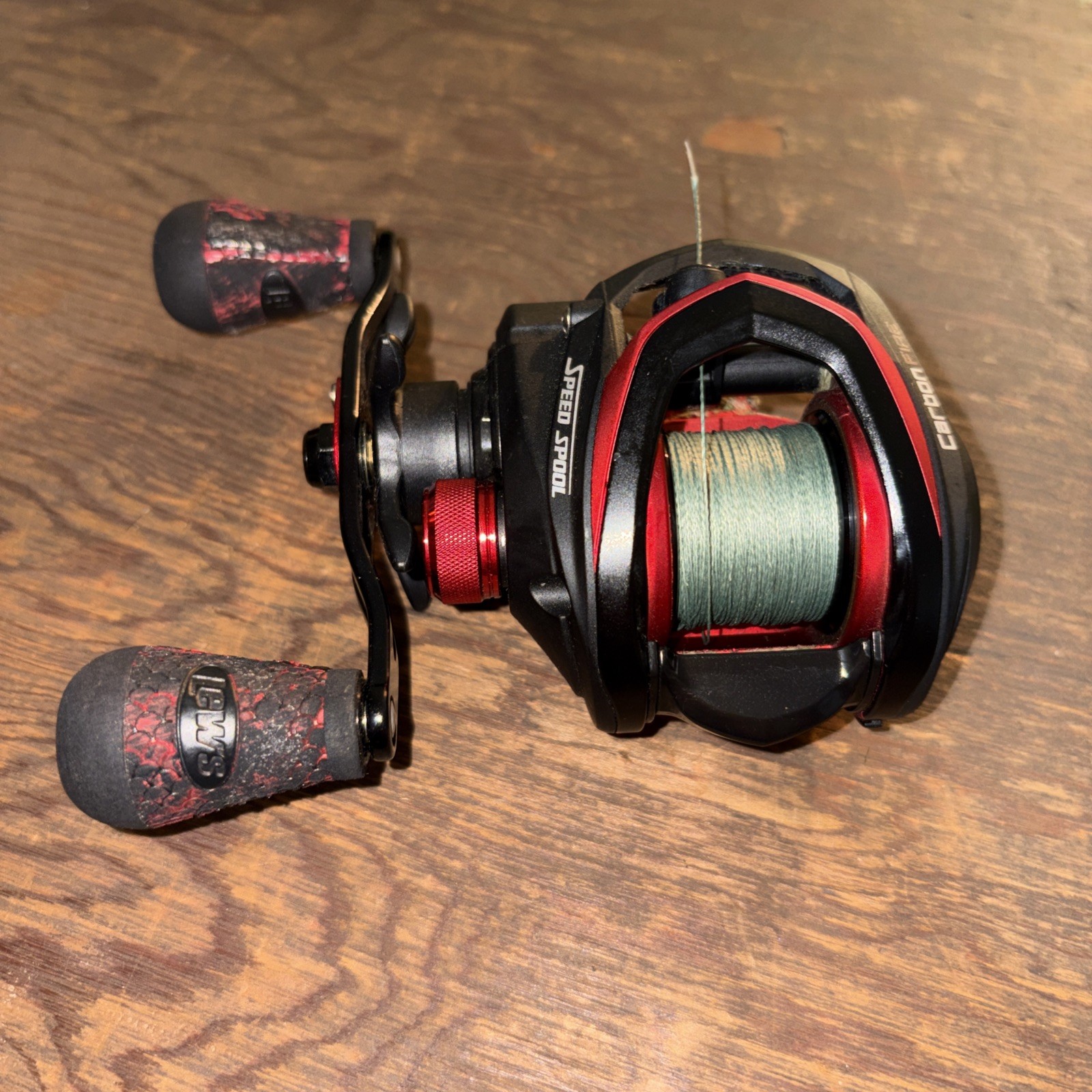 lew’s carbon fire Baitcast reel 7.5:1 Left Hand Retrieve Used 30lb Braid