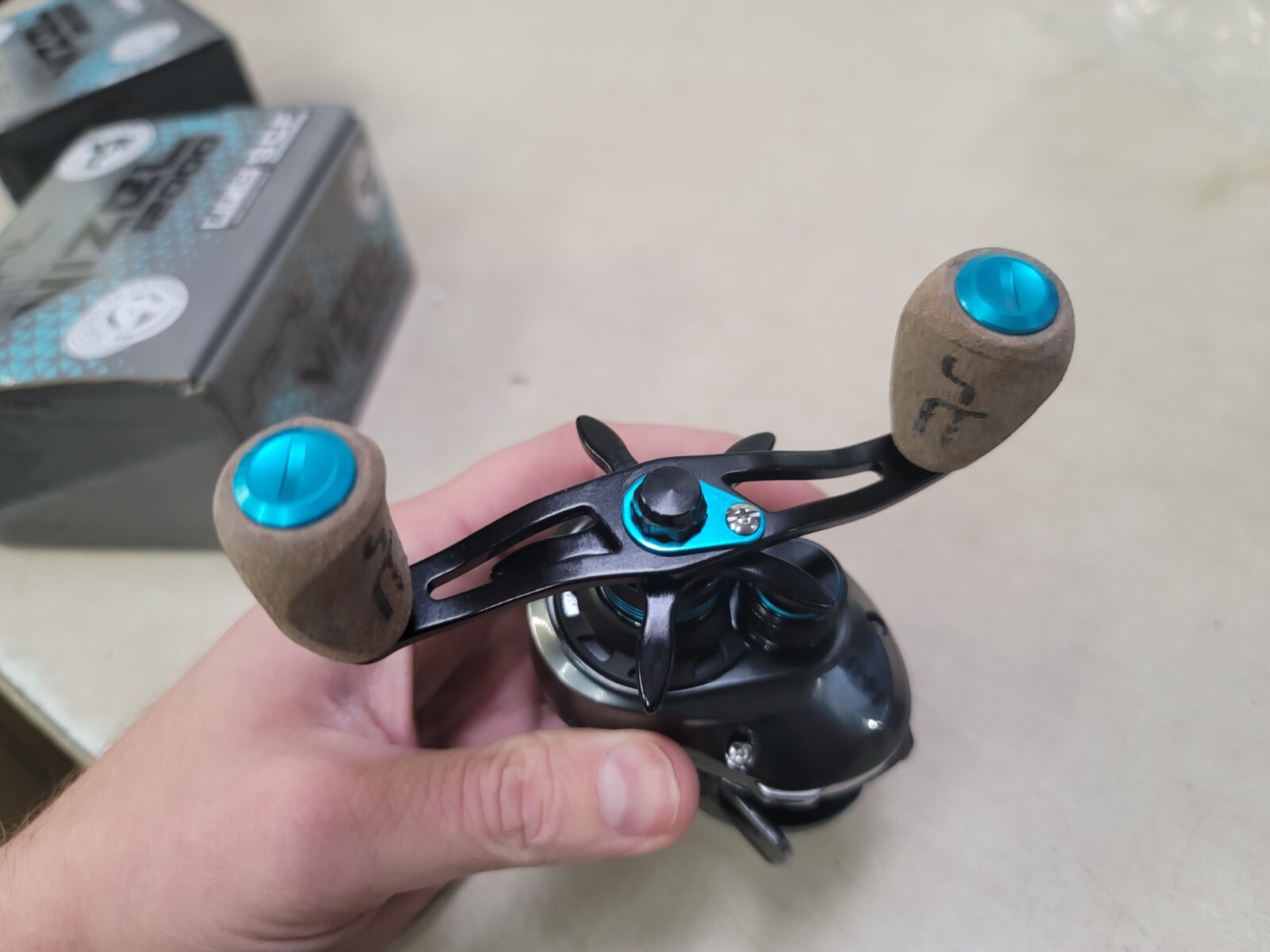 Saint Plus Vizel 12000 Baitcasting Reel New Open Box Cork Knob LEFT