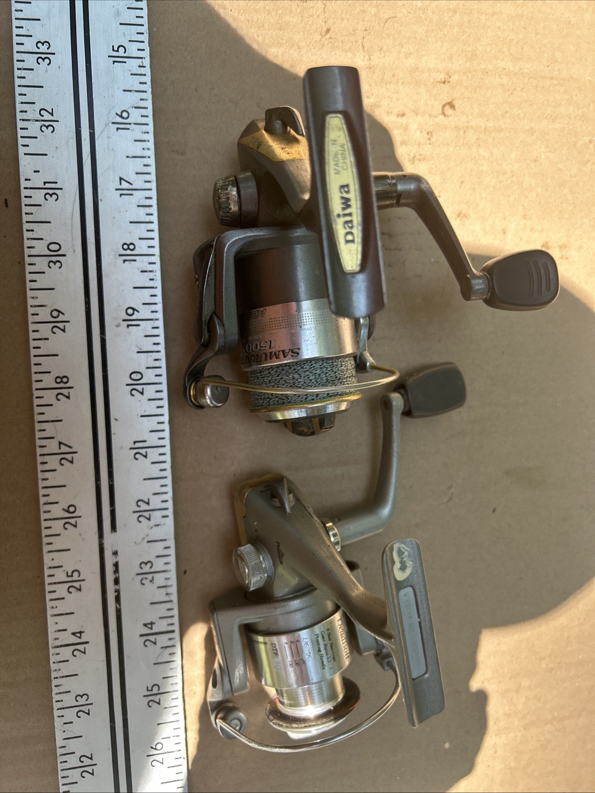 2-spinning Reels One Daiwa And One Pinnacle