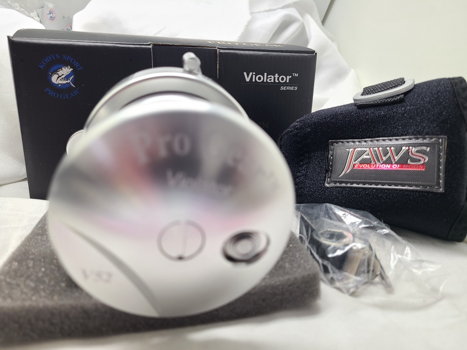 PROGEAR Violator V52 Jigging Live Bait Fishing reel RH Free Ship Jaws Cover SV
